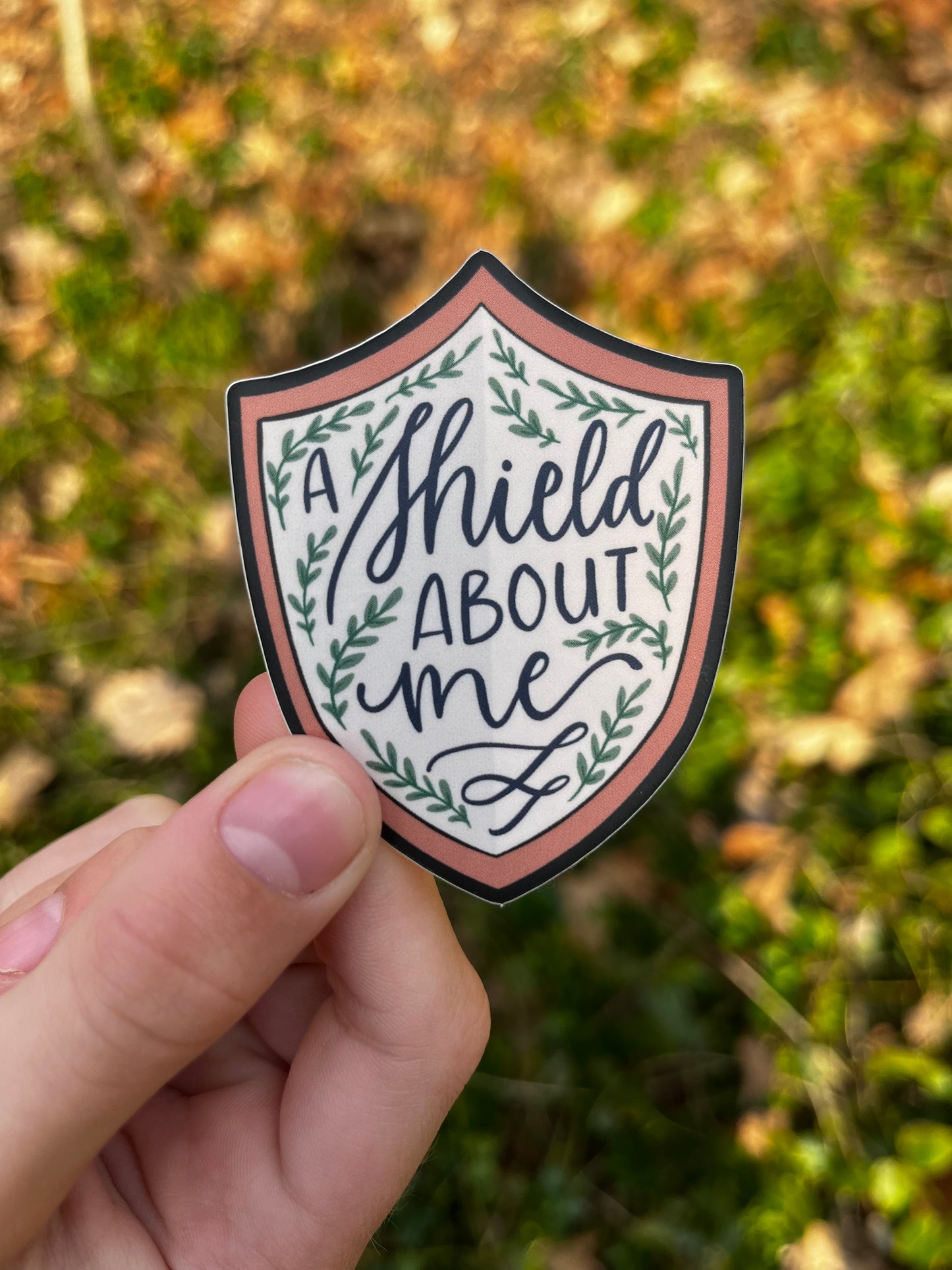 A Shield About Me Sticker